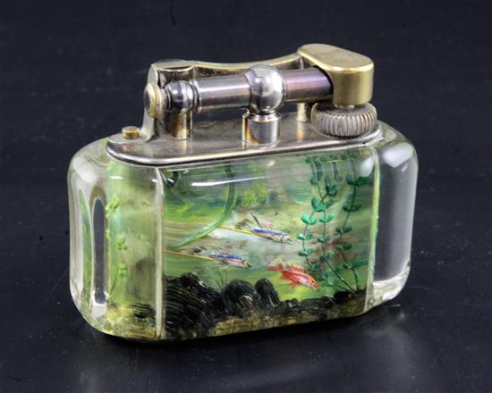 A Dunhill aquarium desk lighter, width 3.75in. height 3in.